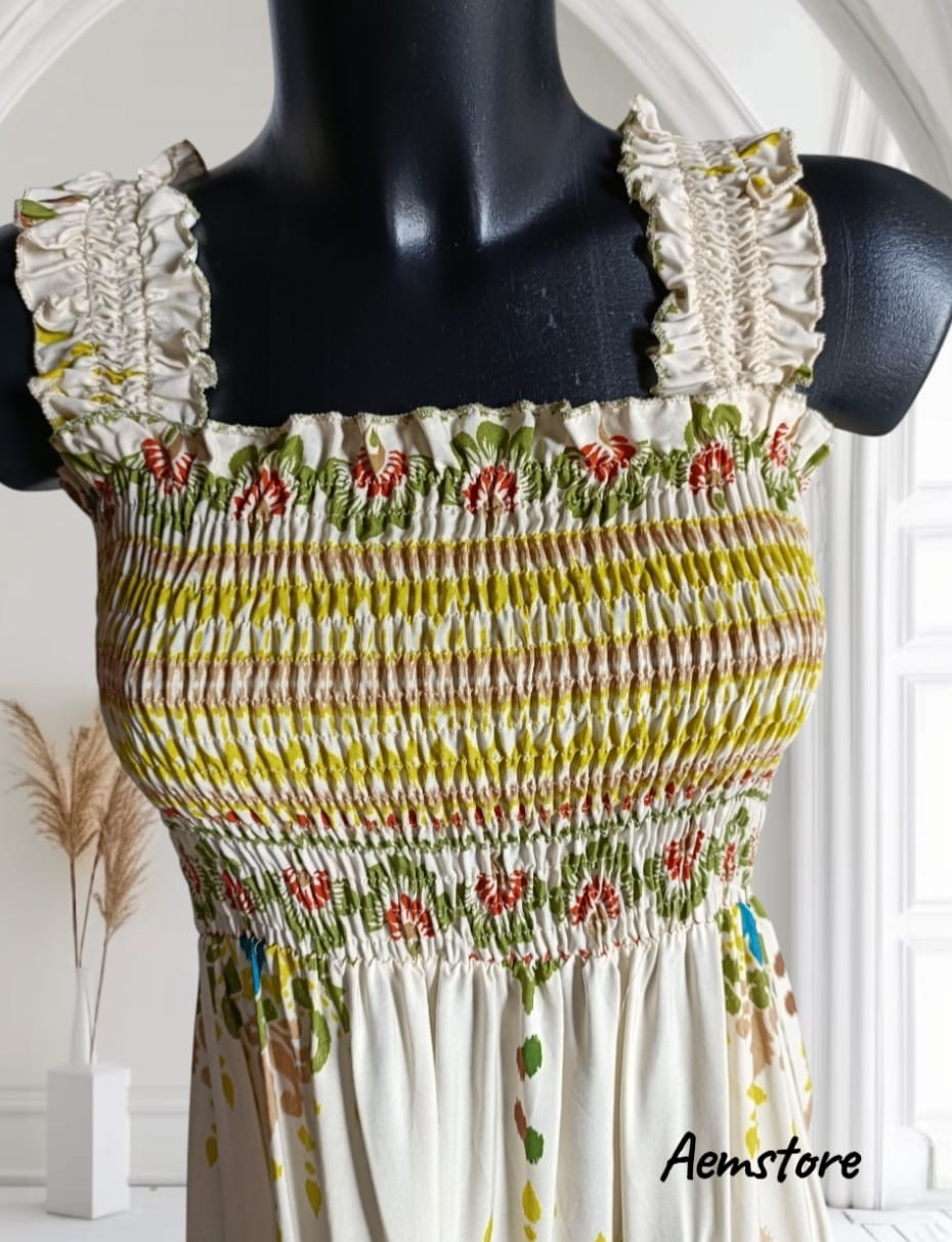 Abito lungo smock con fantasia floreale